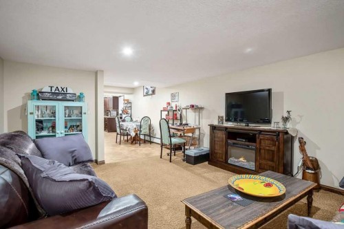 723 5 Avenue Sw, High River, AB - Indoor Photo Showing Living Room