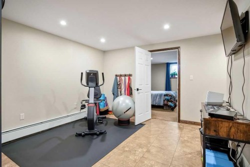 723 5 Avenue Sw, High River, AB - Indoor Photo Showing Gym Room