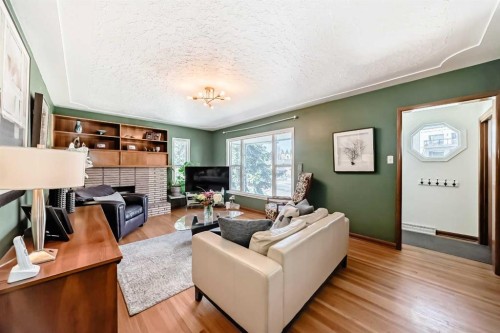 3604 Parkhill Street Sw, Calgary, AB - Indoor Photo Showing Living Room With Fireplace