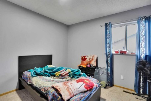 133 Martinglen Way Ne, Calgary, AB - Indoor Photo Showing Bedroom