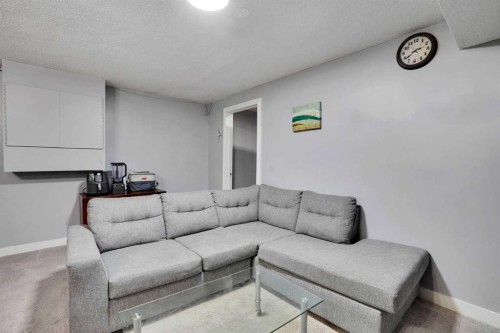 133 Martinglen Way Ne, Calgary, AB - Indoor Photo Showing Living Room