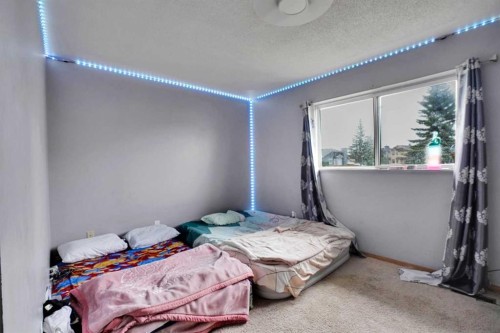133 Martinglen Way Ne, Calgary, AB - Indoor Photo Showing Bedroom