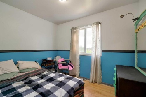 517 55 Avenue West, Claresholm, AB - Indoor Photo Showing Bedroom