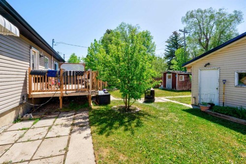 517 55 Avenue West, Claresholm, AB - Outdoor With Deck Patio Veranda With Exterior
