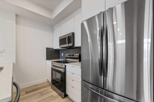 19645 48 Street Se, Calgary, AB - Indoor Photo Showing Kitchen