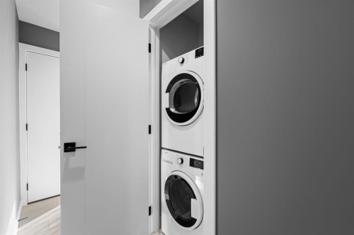 209-310 15 Avenue Sw, Calgary, AB - Indoor Photo Showing Laundry Room