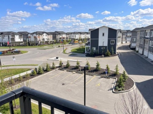 1314-6 Merganger Drive West, Chestermere, AB - Outdoor With Balcony