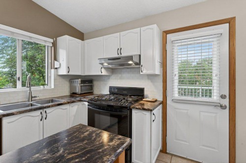 156 Rivercroft Close Se, Calgary, AB 