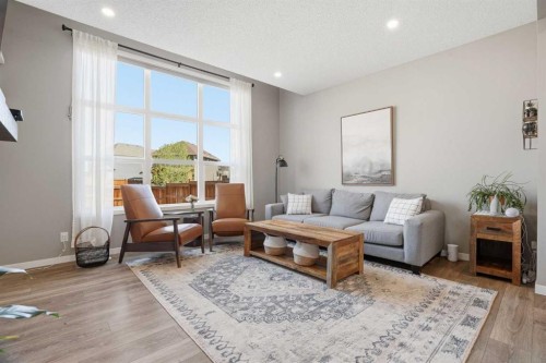 393 Masters Avenue Se, Calgary, AB - Indoor Photo Showing Living Room
