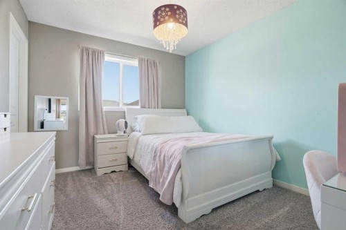 393 Masters Avenue Se, Calgary, AB - Indoor Photo Showing Bedroom