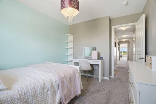 393 Masters Avenue Se, Calgary, AB - Indoor Photo Showing Bedroom