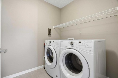 393 Masters Avenue Se, Calgary, AB - Indoor Photo Showing Laundry Room