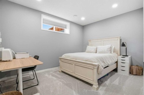 393 Masters Avenue Se, Calgary, AB - Indoor Photo Showing Bedroom