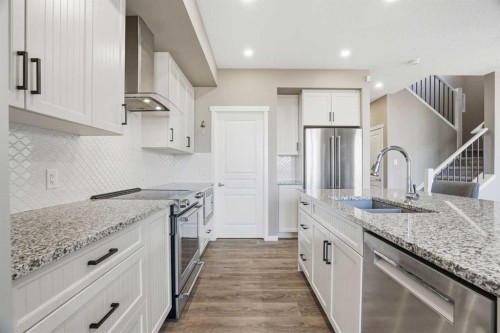 393 Masters Avenue Se, Calgary, AB - Indoor Photo Showing Kitchen With Double Sink With Upgraded Kitchen