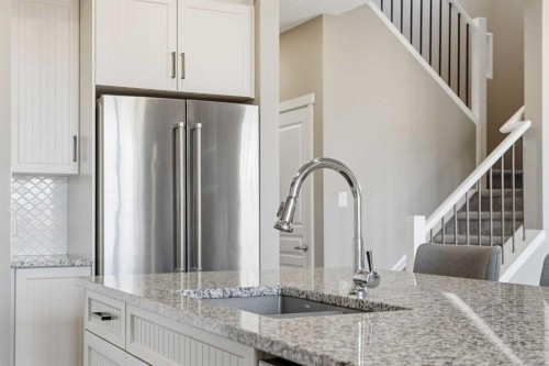 393 Masters Avenue Se, Calgary, AB - Indoor Photo Showing Kitchen With Upgraded Kitchen