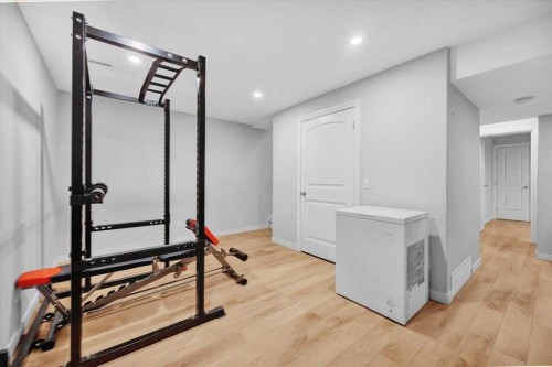917 High Park Way Nw, High River, AB - Indoor Photo Showing Gym Room