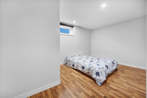 917 High Park Way Nw, High River, AB - Indoor Photo Showing Bedroom