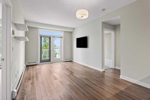 408-2300 Evanston Square Nw, Calgary, AB - Indoor With Fireplace