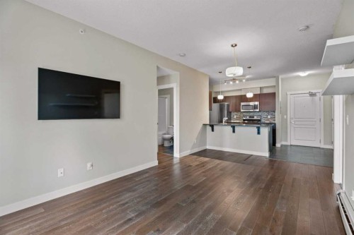408-2300 Evanston Square Nw, Calgary, AB - Indoor Photo Showing Living Room