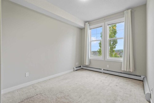 408-2300 Evanston Square Nw, Calgary, AB - Indoor Photo Showing Other Room
