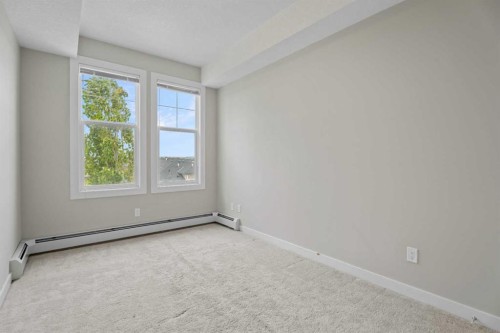 408-2300 Evanston Square Nw, Calgary, AB - Indoor Photo Showing Other Room