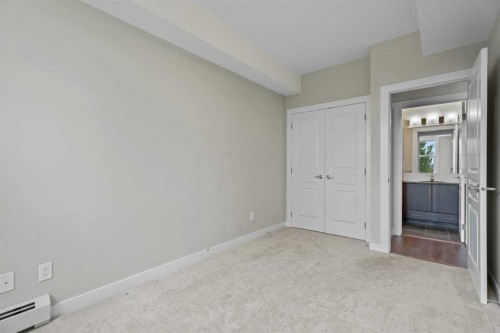 408-2300 Evanston Square Nw, Calgary, AB - Indoor Photo Showing Other Room