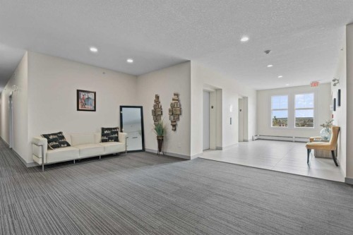 408-2300 Evanston Square Nw, Calgary, AB - Indoor Photo Showing Other Room