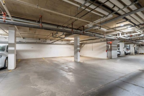 408-2300 Evanston Square Nw, Calgary, AB - Indoor Photo Showing Garage