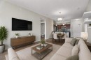 408-2300 Evanston Square Nw, Calgary, AB  - Indoor Photo Showing Living Room 