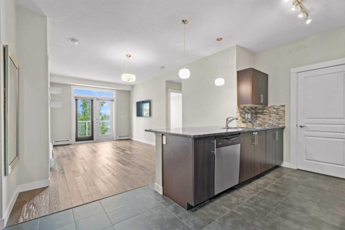 408-2300 Evanston Square Nw, Calgary, AB - Indoor Photo Showing Kitchen With Upgraded Kitchen