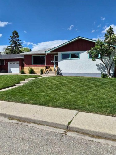 126 Springwood Drive Sw, Calgary, AB 