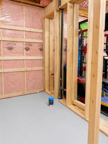 98 Evanscove Circle Nw, Calgary, AB - Indoor Photo Showing Basement