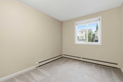 723-6400 Coach Hill Road Sw, Calgary, AB - Indoor Photo Showing Other Room