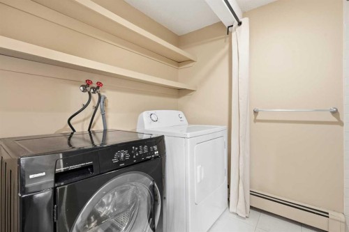 723-6400 Coach Hill Road Sw, Calgary, AB - Indoor Photo Showing Laundry Room
