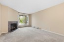 723-6400 Coach Hill Road Sw, Calgary, AB  - Indoor With Fireplace 