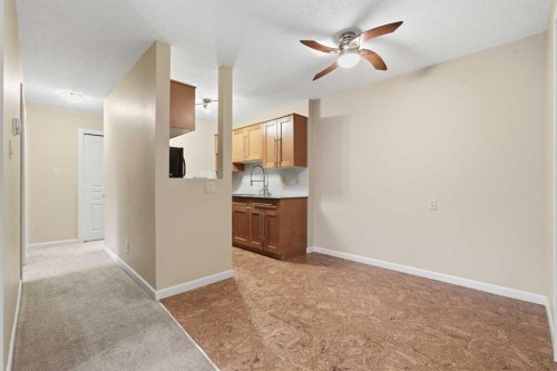 723-6400 Coach Hill Road Sw, Calgary, AB - Indoor Photo Showing Other Room