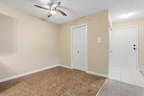 723-6400 Coach Hill Road Sw, Calgary, AB - Indoor Photo Showing Other Room