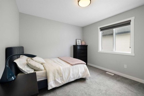 836 Edgefield Street, Strathmore, AB - Indoor Photo Showing Bedroom