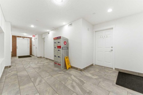 1204-755 Copperpond Boulevard Se, Calgary, AB - Indoor Photo Showing Other Room