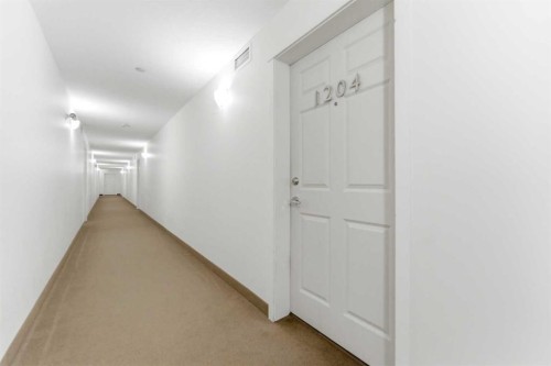1204-755 Copperpond Boulevard Se, Calgary, AB - Indoor Photo Showing Other Room