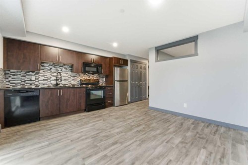 1204-755 Copperpond Boulevard Se, Calgary, AB - Indoor Photo Showing Kitchen With Upgraded Kitchen
