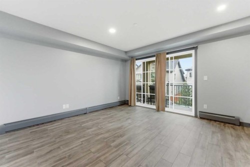 1204-755 Copperpond Boulevard Se, Calgary, AB - Indoor Photo Showing Other Room