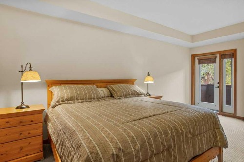 202-505 Spring Creek Drive, Canmore, AB - Indoor Photo Showing Bedroom