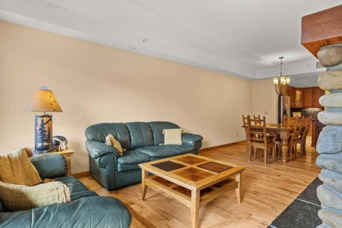202-505 Spring Creek Drive, Canmore, AB - Indoor Photo Showing Living Room