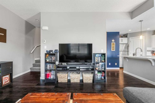 903-881 Sage Valley Boulevard, Calgary, AB - Indoor Photo Showing Living Room With Fireplace