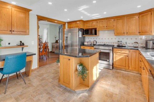 4 Hamptons Heath Nw, Calgary, AB - Indoor Photo Showing Kitchen With Double Sink