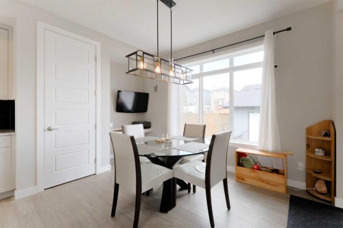 41 Precedence Glen, Cochrane, AB - Indoor Photo Showing Dining Room