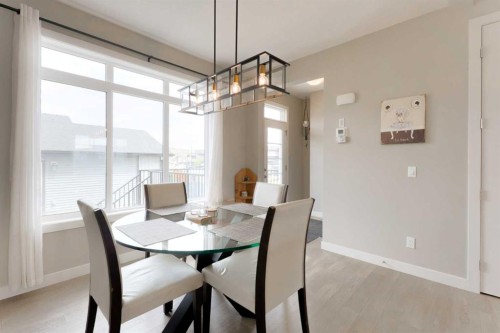 41 Precedence Glen, Cochrane, AB - Indoor Photo Showing Dining Room