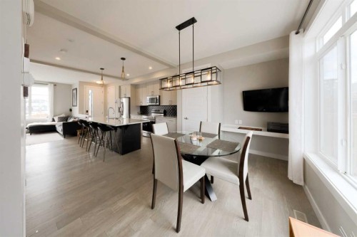 41 Precedence Glen, Cochrane, AB - Indoor Photo Showing Dining Room