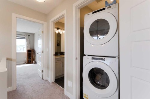 41 Precedence Glen, Cochrane, AB - Indoor Photo Showing Laundry Room